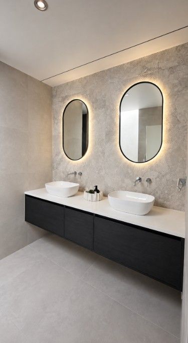 Capsule backlight mirrors beautiful bathroom
