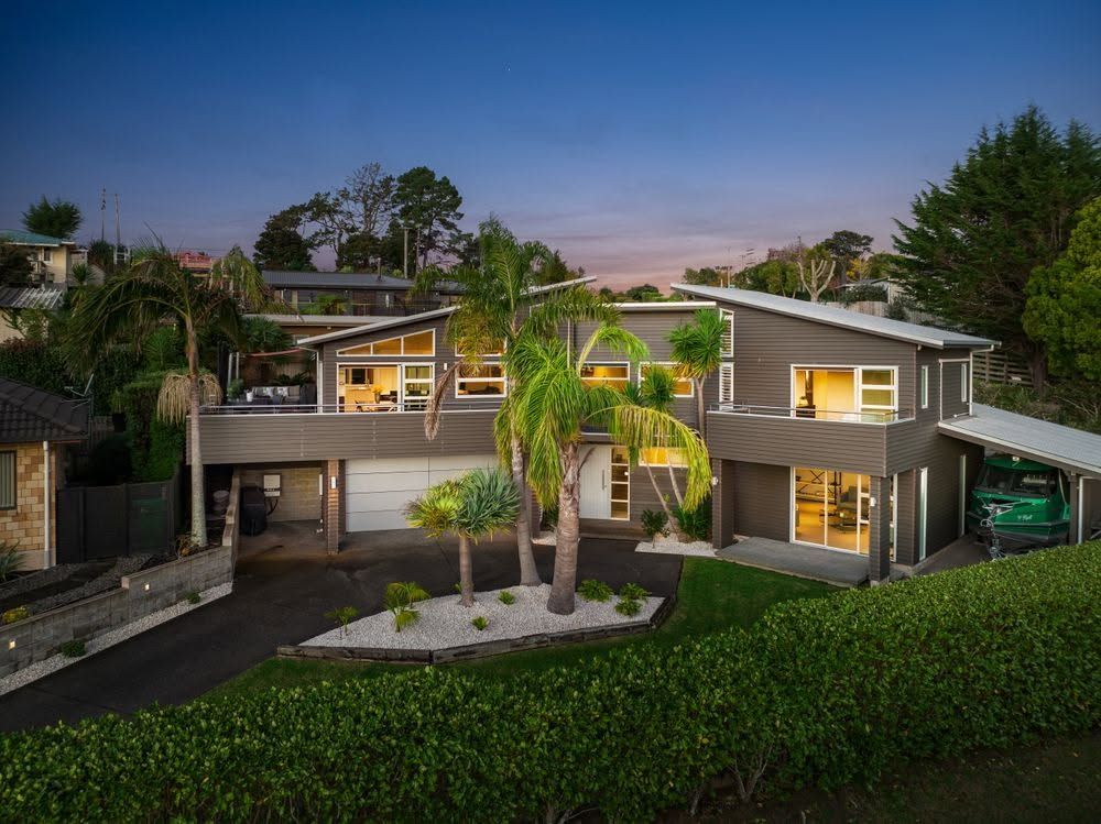 Beautiful New Zealand weatherboard home dusk
