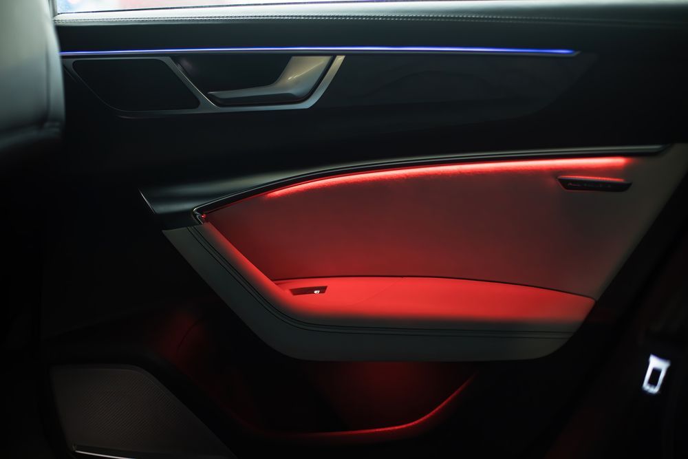 A Car Door With a Red Light on It — Auto Electrical Solutions In Pialba, QLD