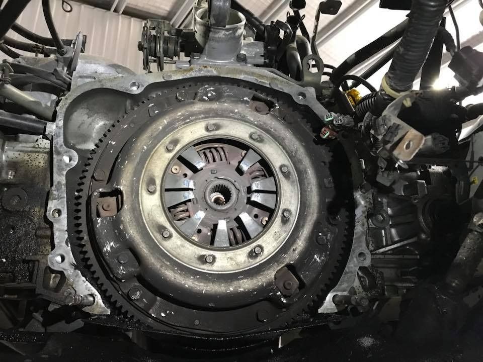A Close Up Of A Clutch On A Car Engine — Auto Electrical Solutions In Pialba, QLD