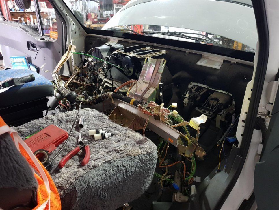 The Dashboard Of A Car Is Being Dismantled In A Garage — Auto Electrical Solutions In Pialba, QLD