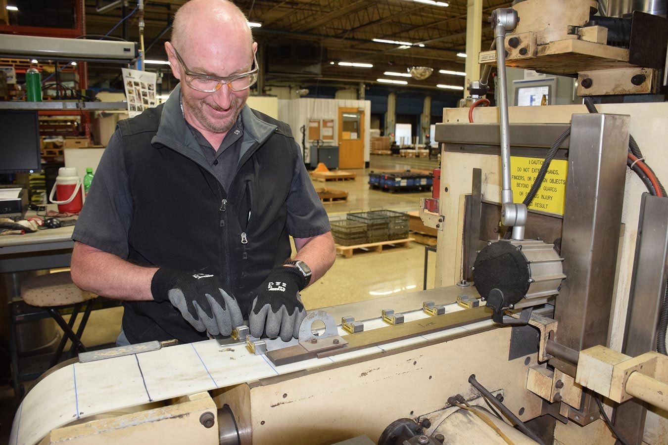 Automated assembly of electrical relay and solenoid cores