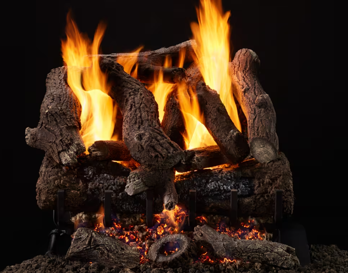 Heritage Oak indoor gas logs in a fireplace, with bright orange flames and glowing embers