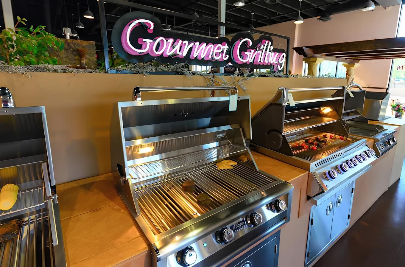 Gourmet Grill buffet line with stainless steel warming trays and a glowing pink sign in a modern restaurant