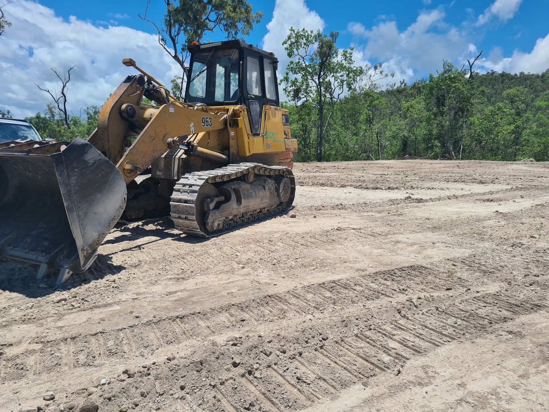 Two Bulldozers Are Working On A Construction Site — Blue Dog Hire Qld In Bowen, QLD
