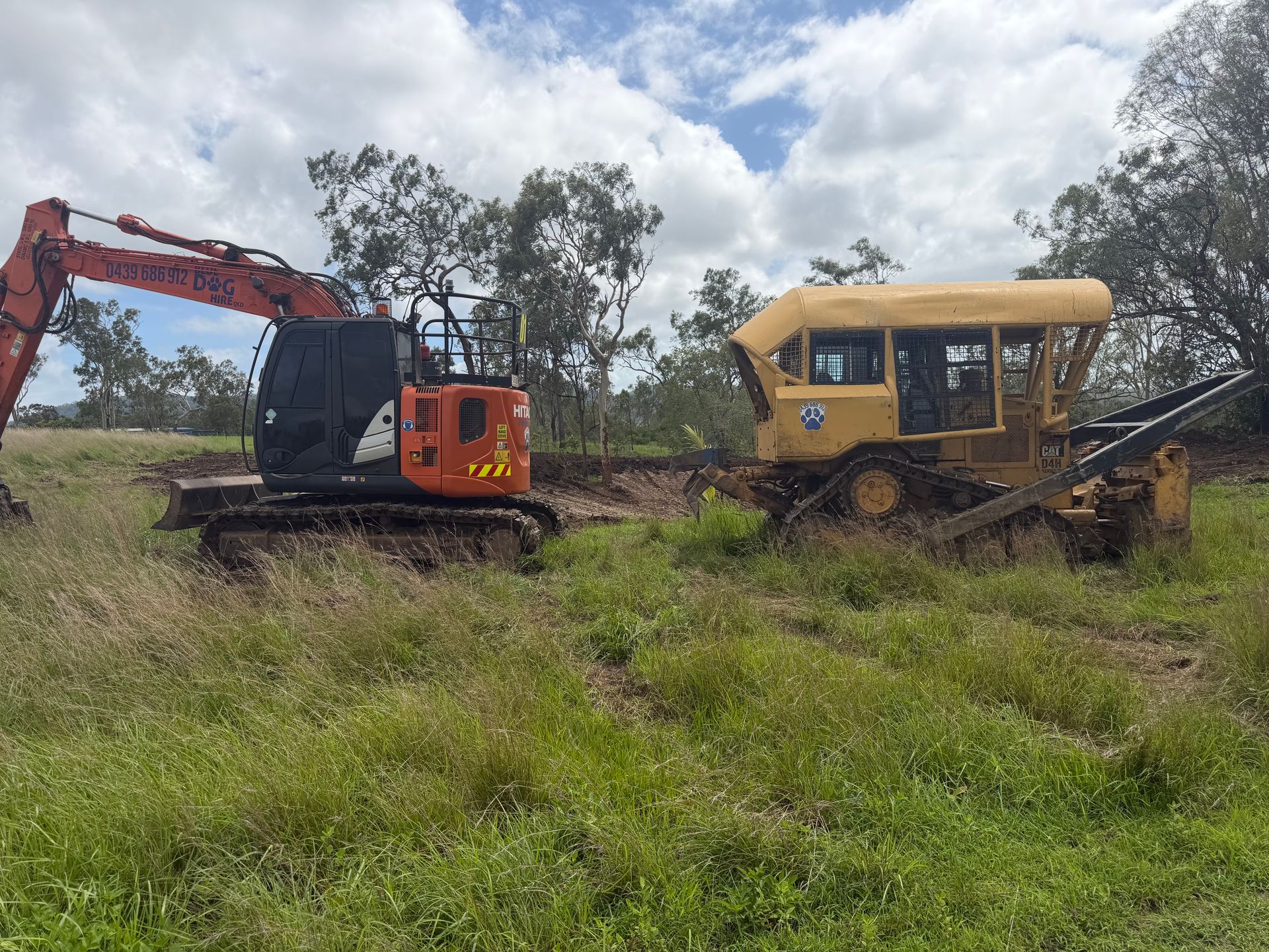 Orange Excavator And Yellow Bulldozer — Blue Dog Hire Qld In Midge Point, QLD