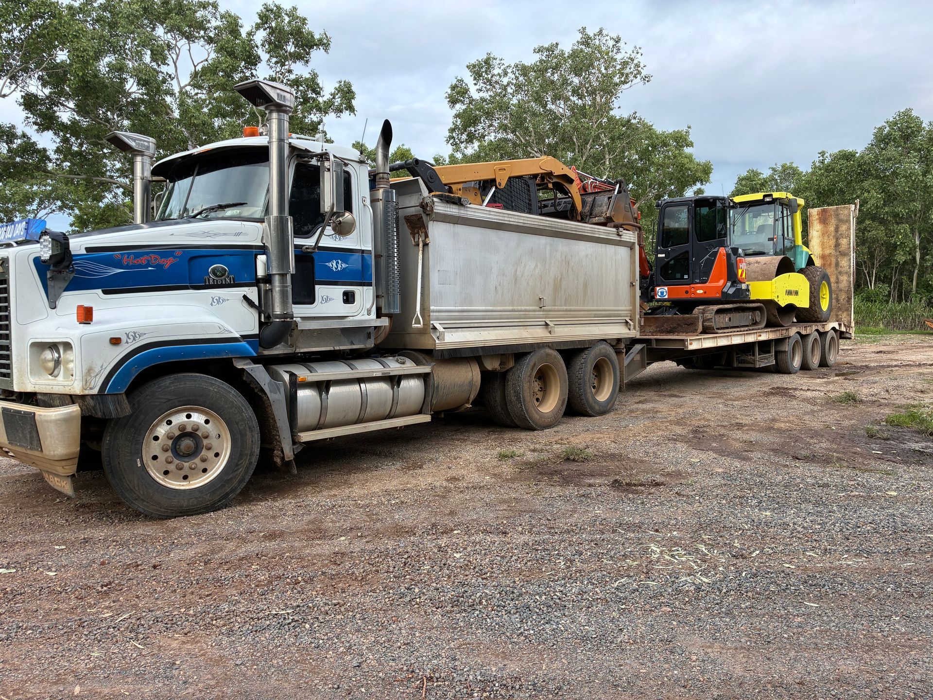Blue Dump Truck And Excavator Parked — Blue Dog Hire Qld In Mackay, QLD