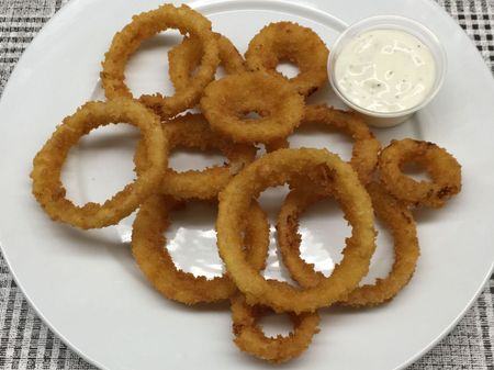 Closeup Crispy Onion Rings — Milwaukee, WI — Gold Rush Chicken
