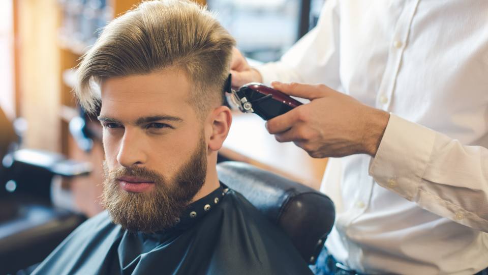 man getting a hair cut
