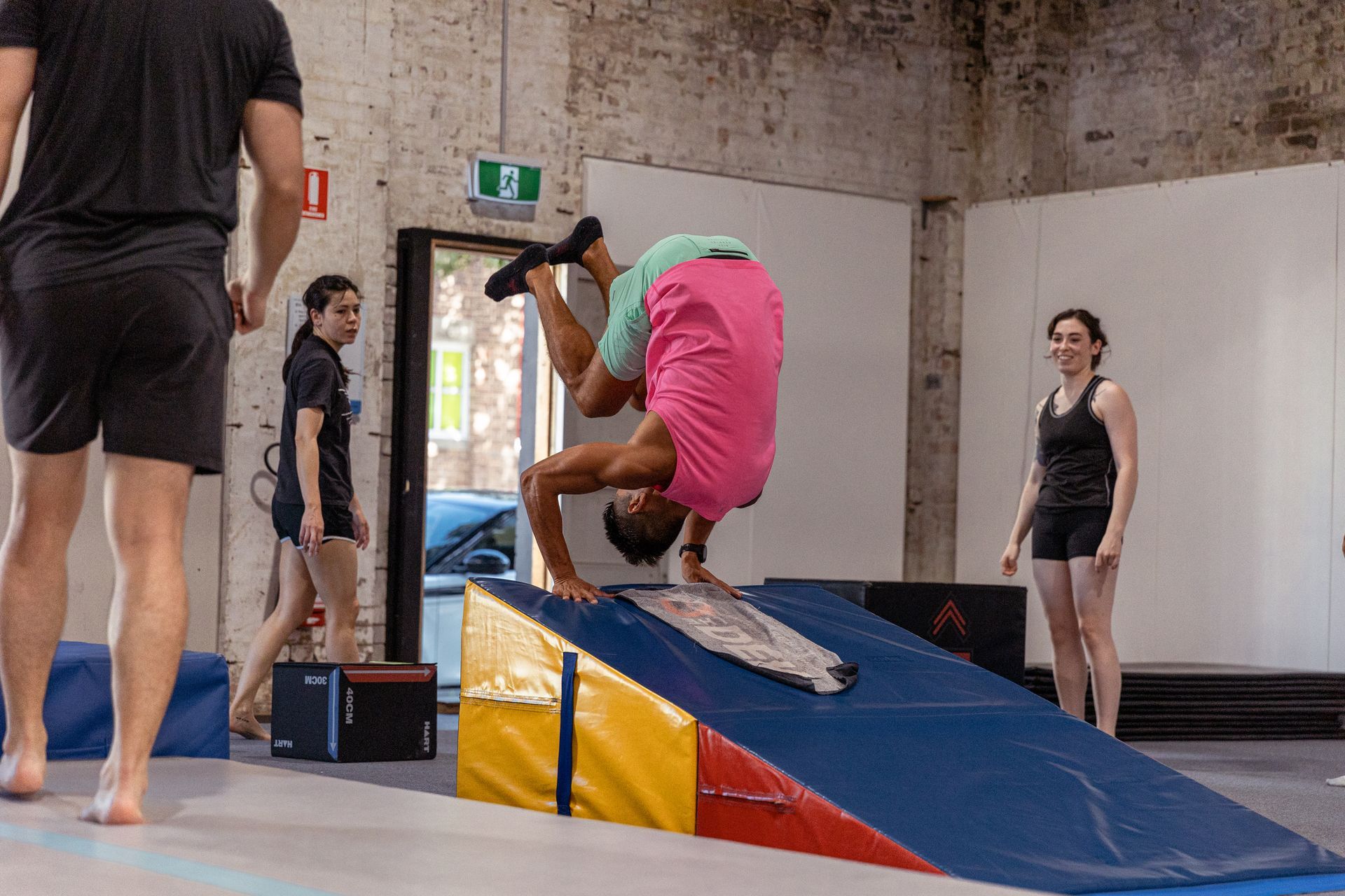 Image of people doing gymnastics in the gym