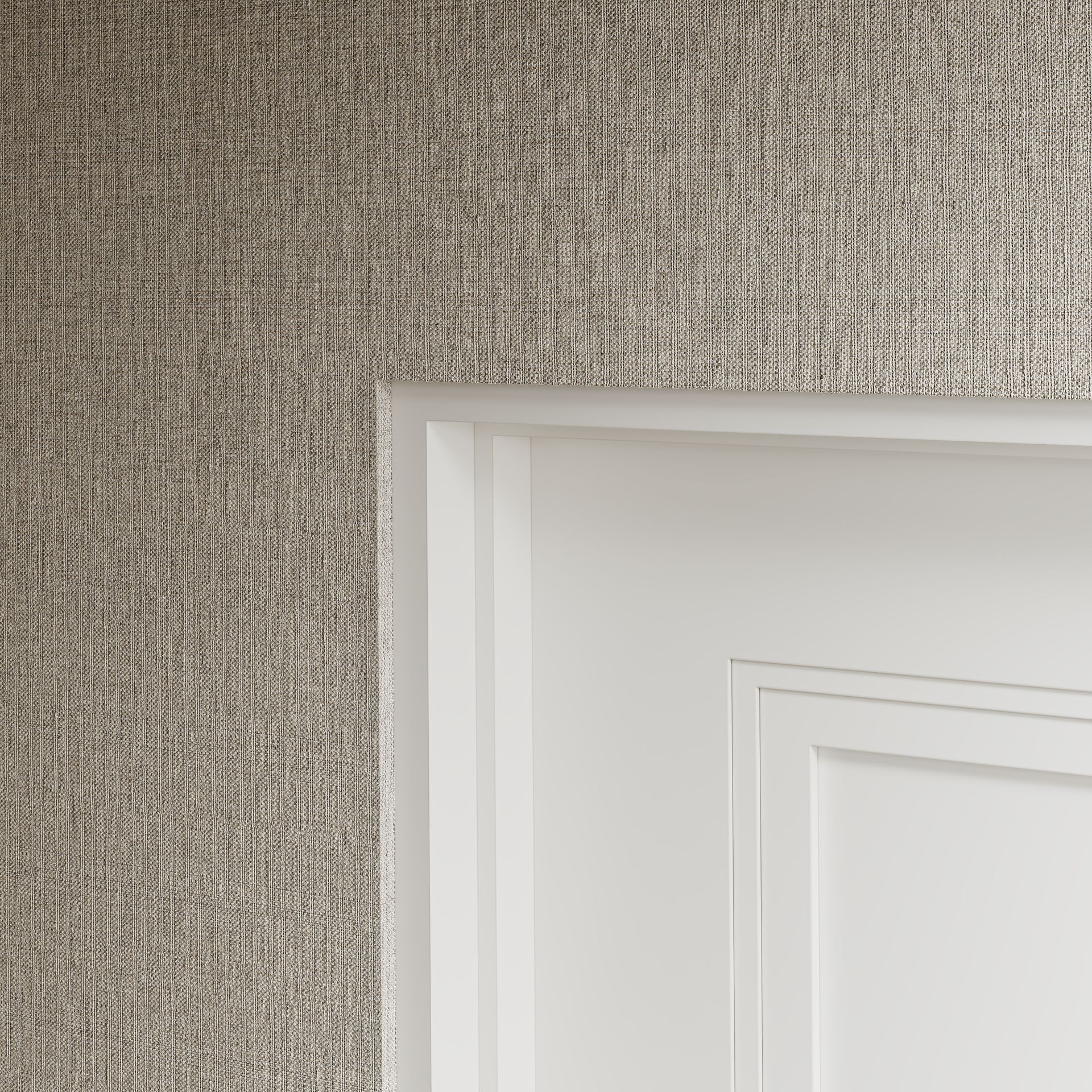 A close up of a white door with a beige wallpaper on the wall.