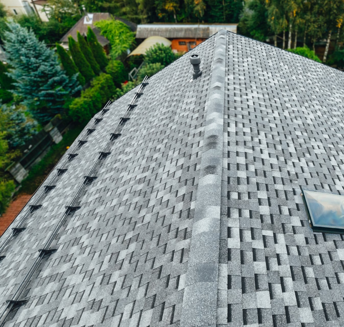 a roof with a skylight and stairs on it