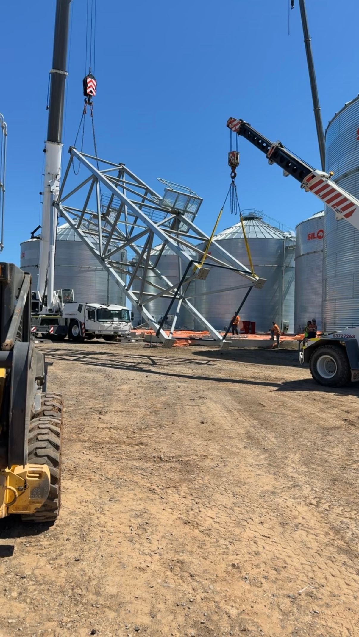 A Metal Frame Being Craned — Absolute Steel Fabrication & Welding In East Wagga Wagga, NSW
