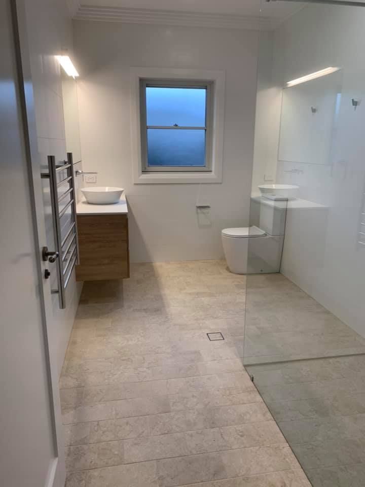 An View of A Bathroom with Toilet and vanity — GMT Builders Pty Ltd in Mittagong, NSW