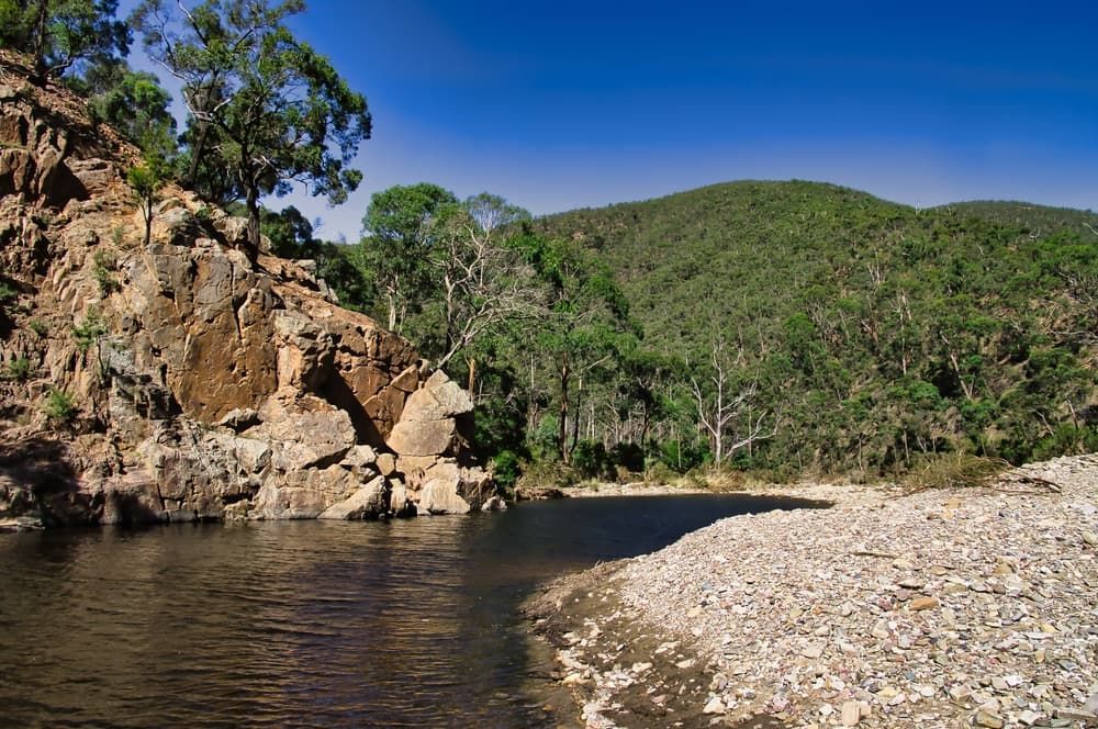 River Surrounded by Rocks and Trees With Mountains — GMT Builders Pty Ltd in Mittagong, NSW