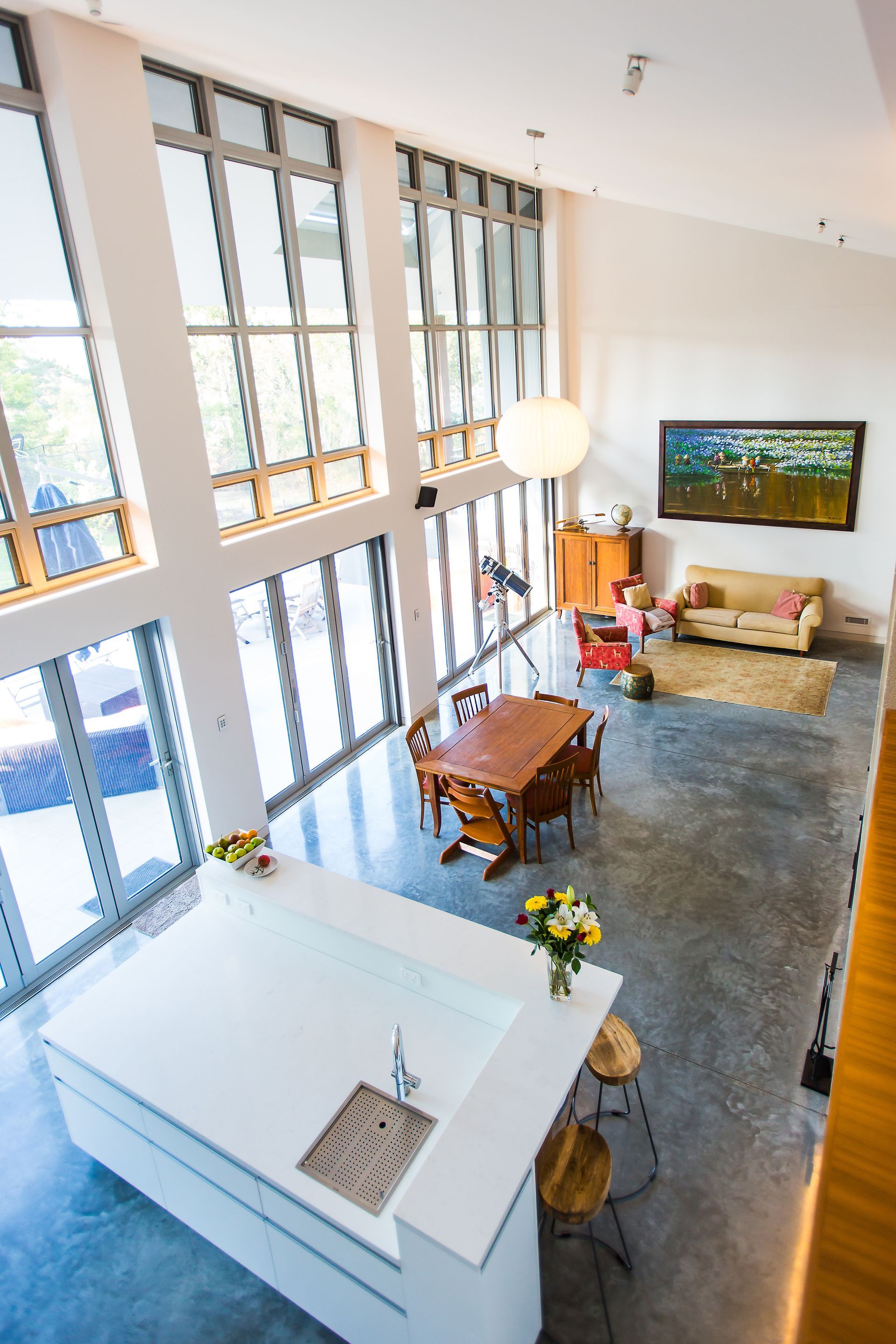 An aerial view of a living room and kitchen in a house — GMT Builders Pty Ltd in Sunninghill, NSW