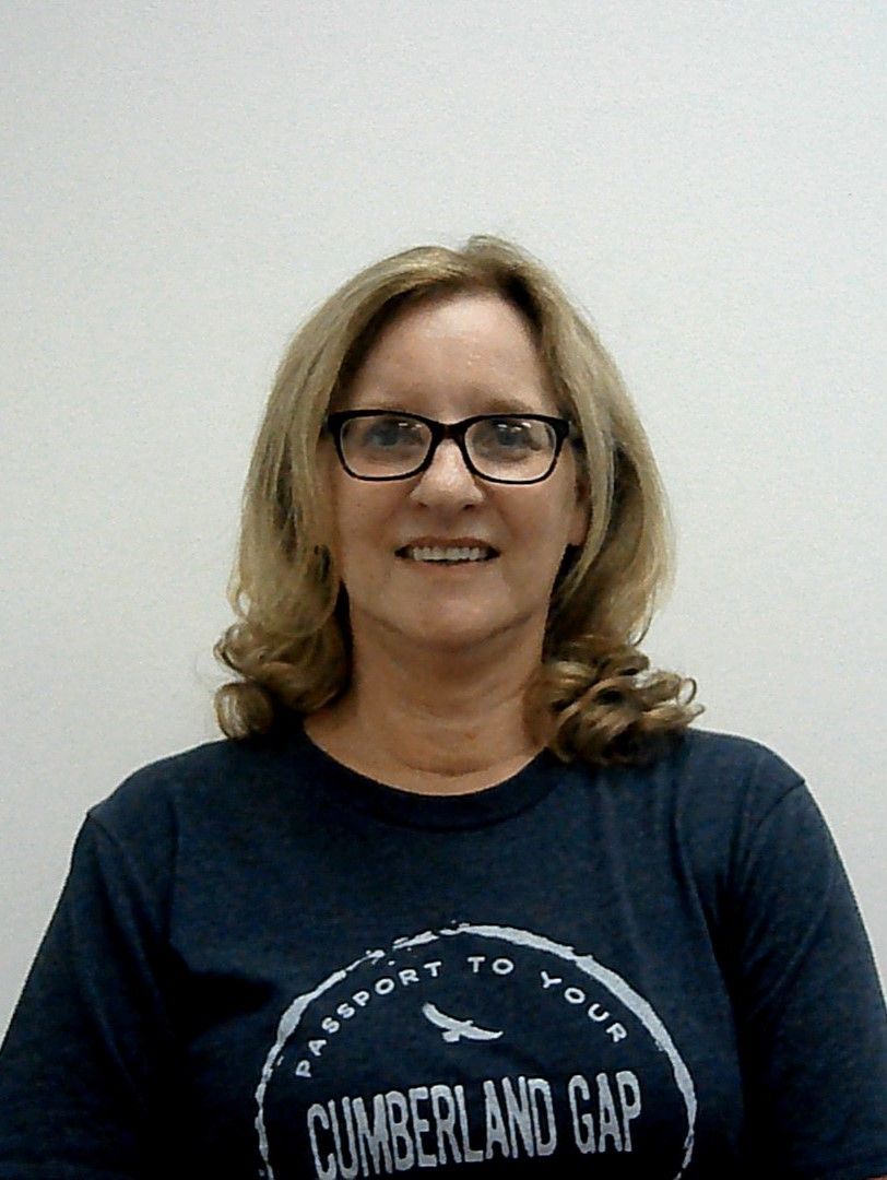 A woman wearing glasses and a shirt that says cumberland gap