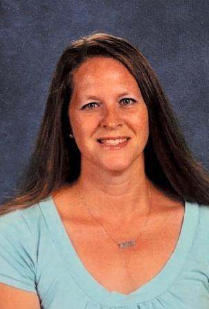 A man wearing a red shirt. This is Derek Morman.