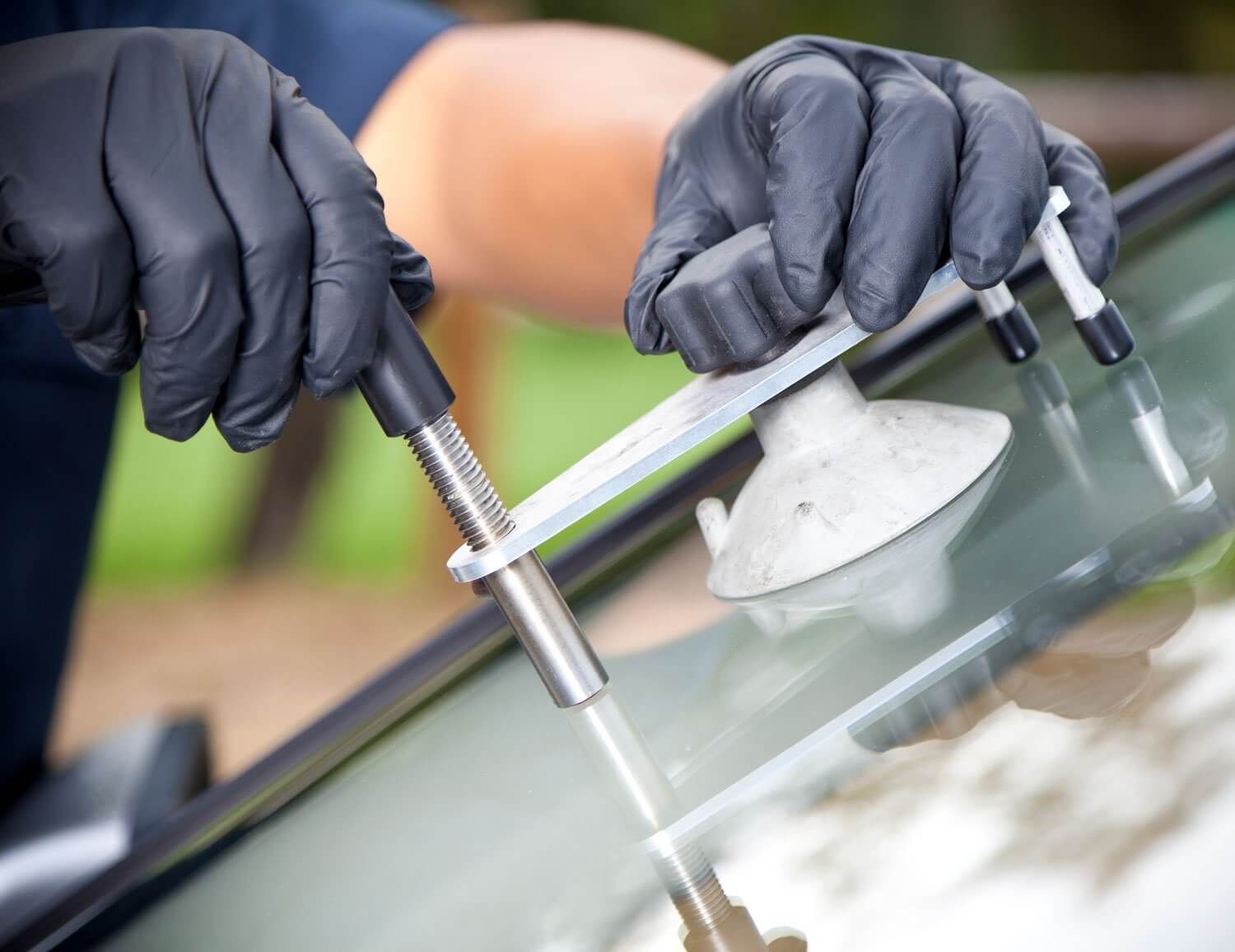 Repairing Auto Glass — Elmer, NJ — All State Auto Glass LLC A close view of a professional auto glass repair in Mullica Hill, NJ