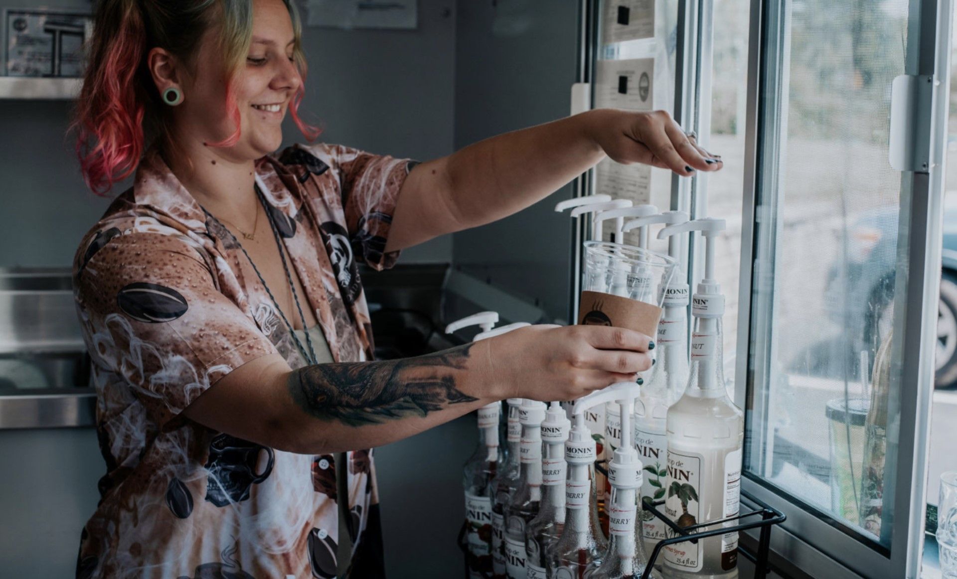 Woman making a Specialyu Drink - Grindhead Coffee - Chattanooga, TN