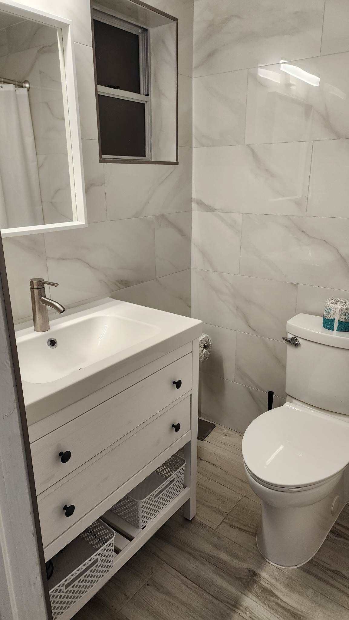 Bathroom at By the Beach Rentals Remodeled Apartment #4