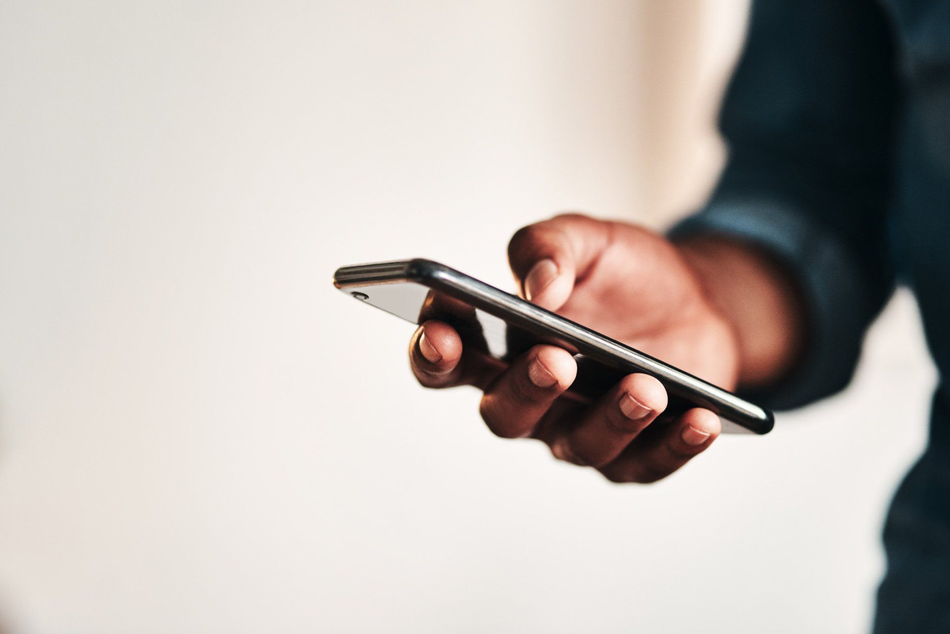 Touching the screen of phone — Waldorf, MD — Southern Maryland Minority Chamber of Commerce