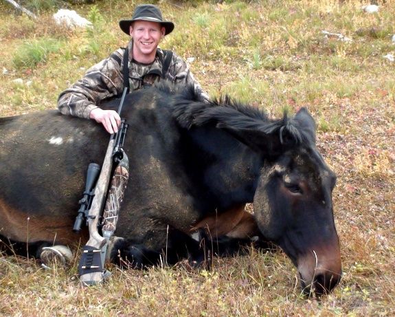 Hunter with horse