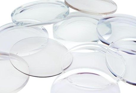 A bunch of different colored lenses are stacked on top of each other