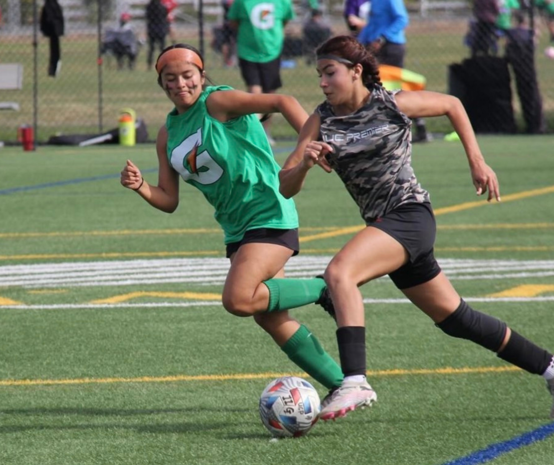 UC Premier soccer club players in action with Byga