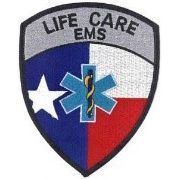 Life Care EMS shield logo in blue, red, and gray with a white star and blue medical symbol