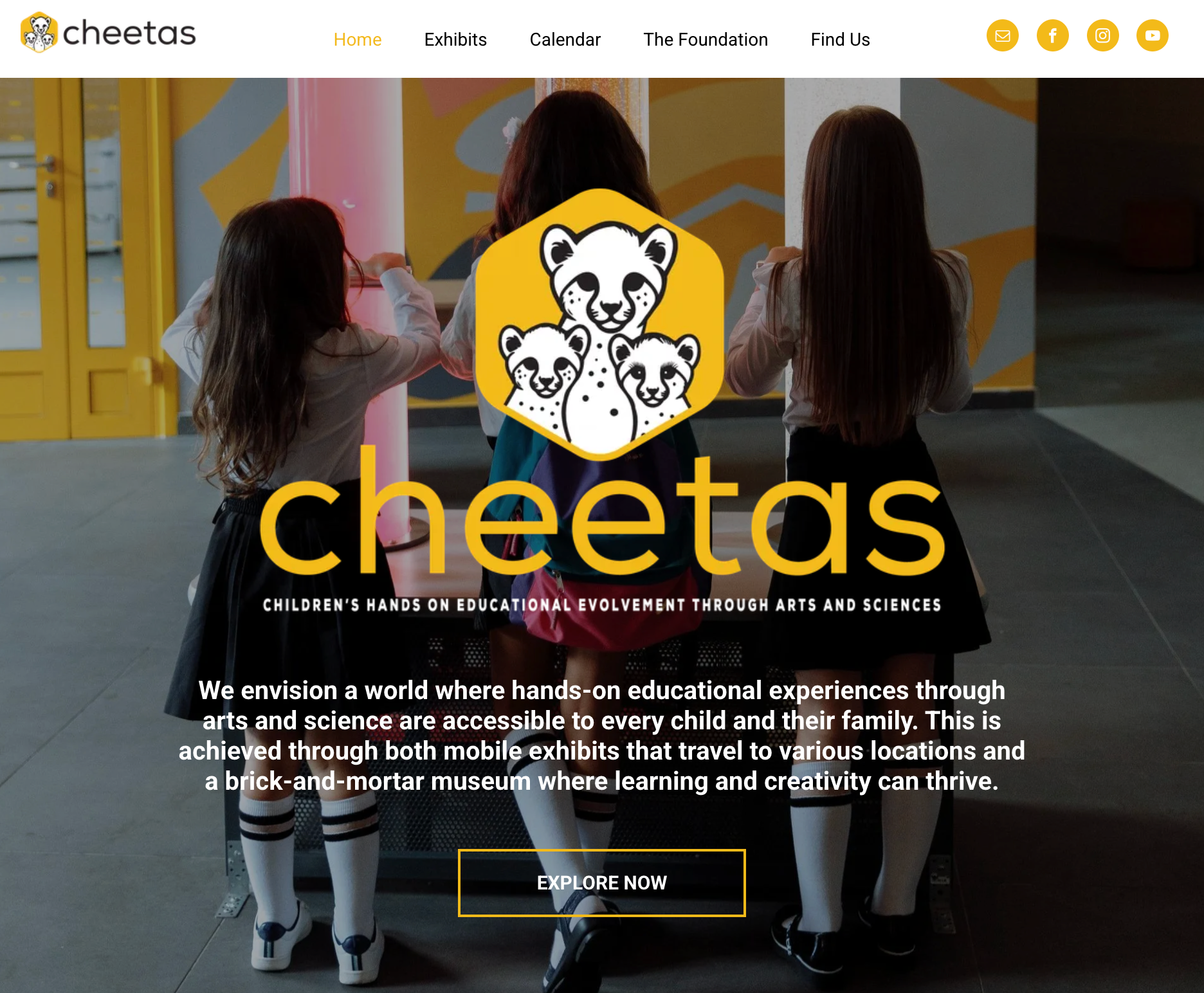 Children looking at a logo for