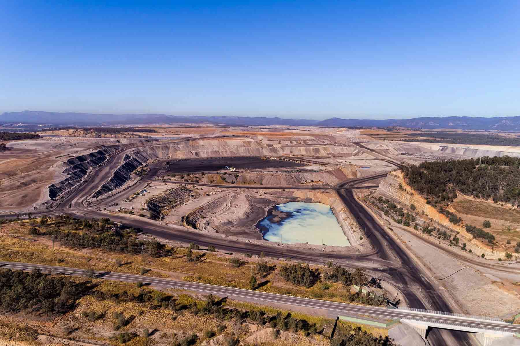 An Aerial View Of A Large Open Pit Mine — Tim's Towing and Transport In Mount Thorley, NSW