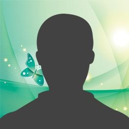 Silhouette of a person on a green abstract background with a butterfly and light swirls