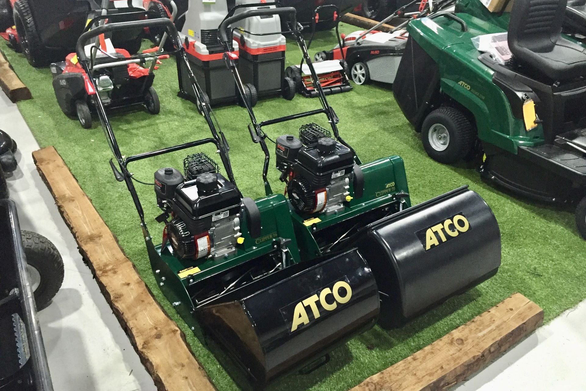 Photograph of two ATCO Clipper petrol powered cylinder mowers, on sale at Cyril Johnston, Belfast, United Kingdom.