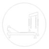 Illustration of a hospital bed with a patient and IV stand in a medical room, inside a circular border