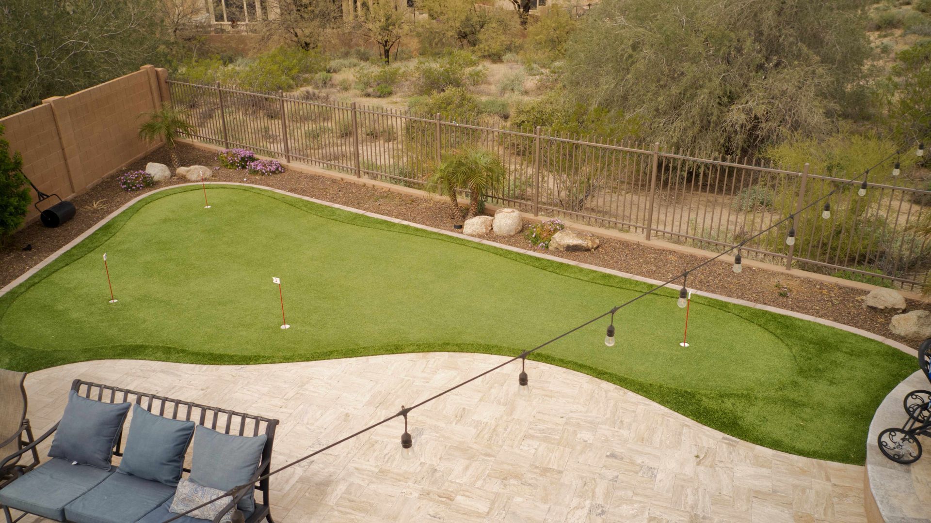 a large putting green in someone's yard in arizona