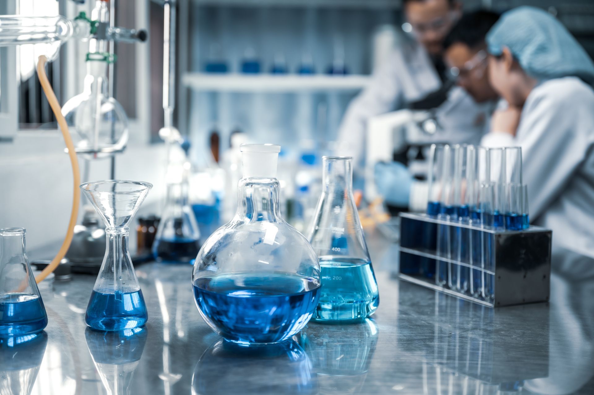A group of scientists are working in a laboratory.