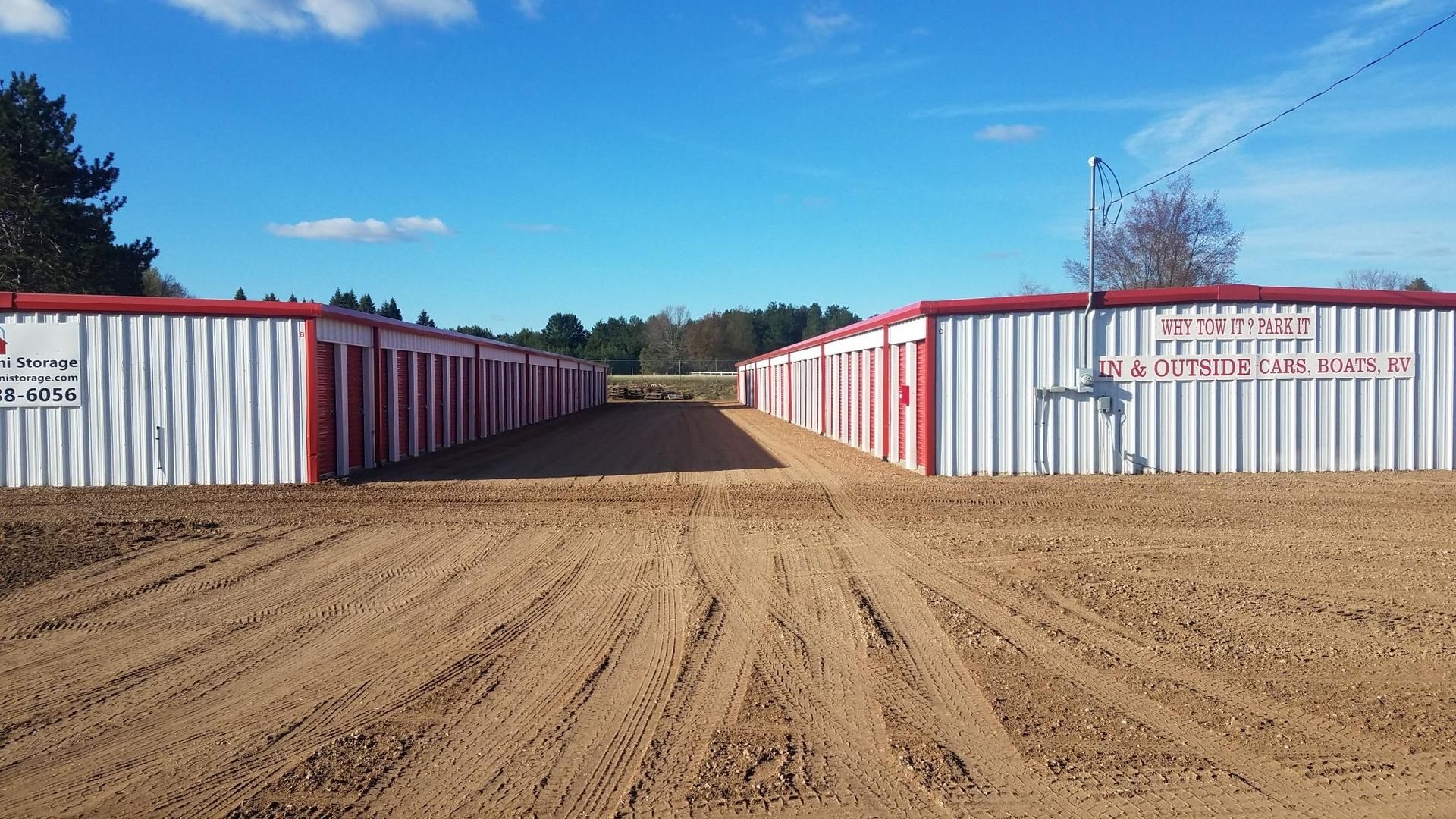 Middle aisle of drive up storage units. 