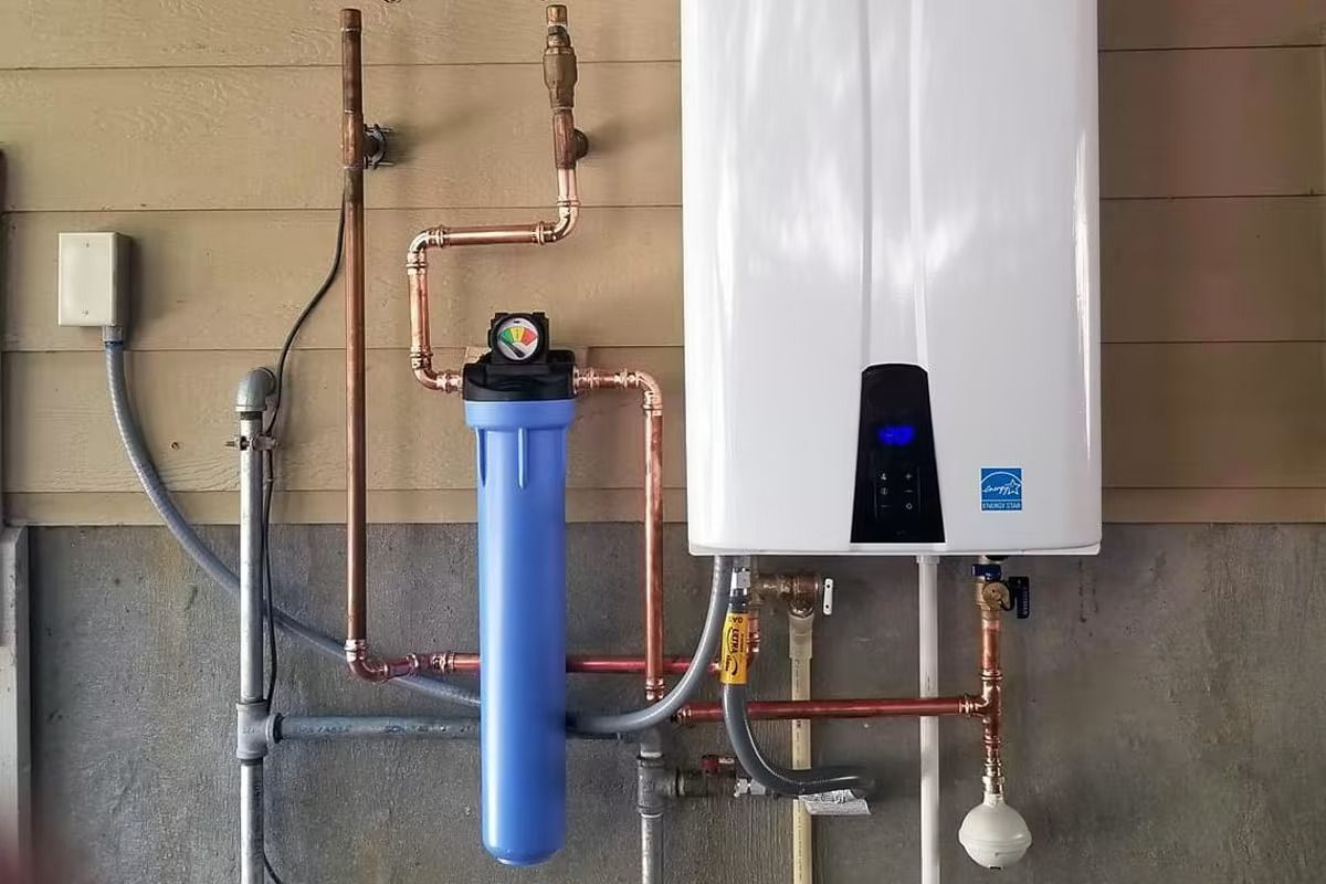Water Heater and Filter System With Copper Pipes on a Wall — Vantage Plumbing and Drainage In Pacific Pines, QLD