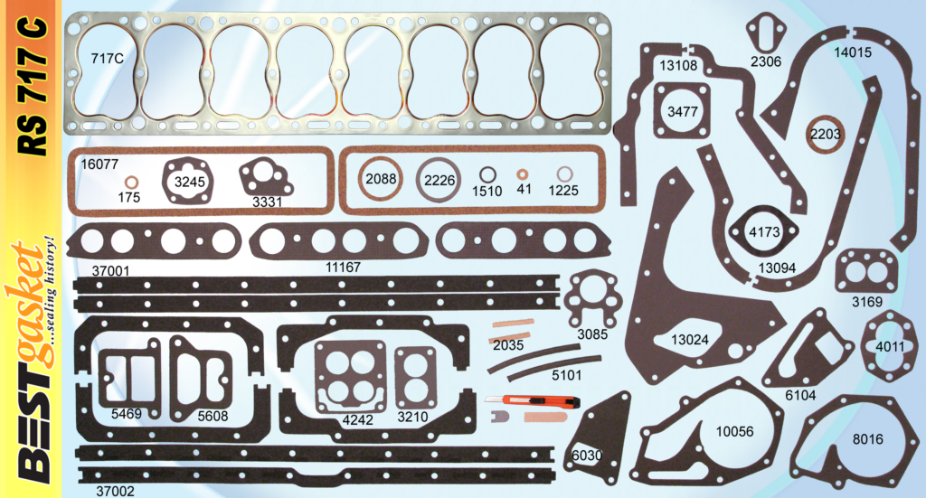 Various automotive exhaust gaskets and rings laid out on a wooden surface. Different shapes and sizes, mainly black and silver.