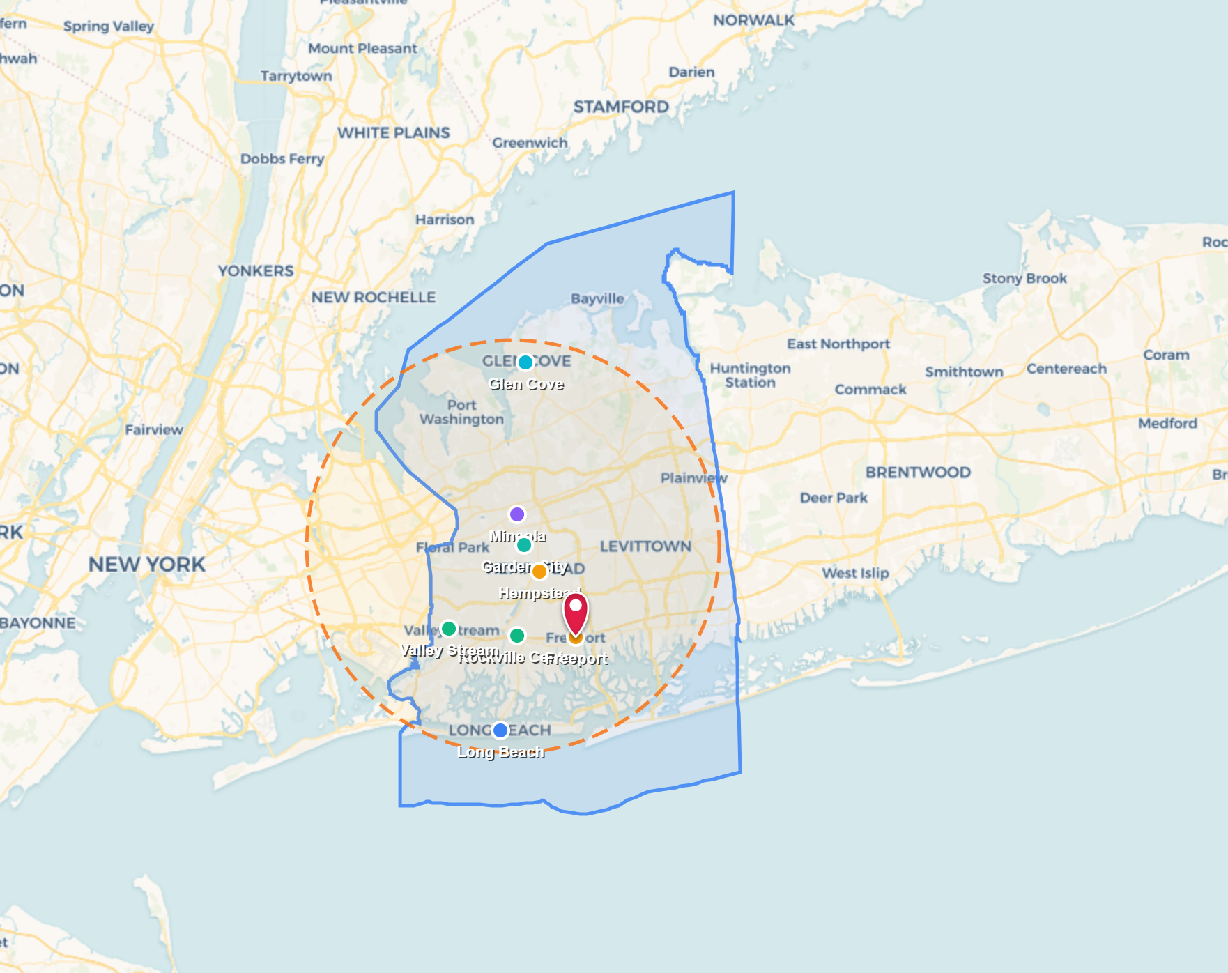 Map with a green and blue outlined region, clustered markers, and a dashed circular area around central locations