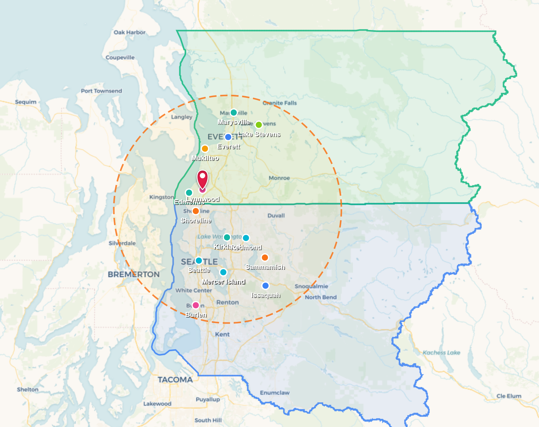 Map of a city with colored boundary outlines and a marked central point on a pale background