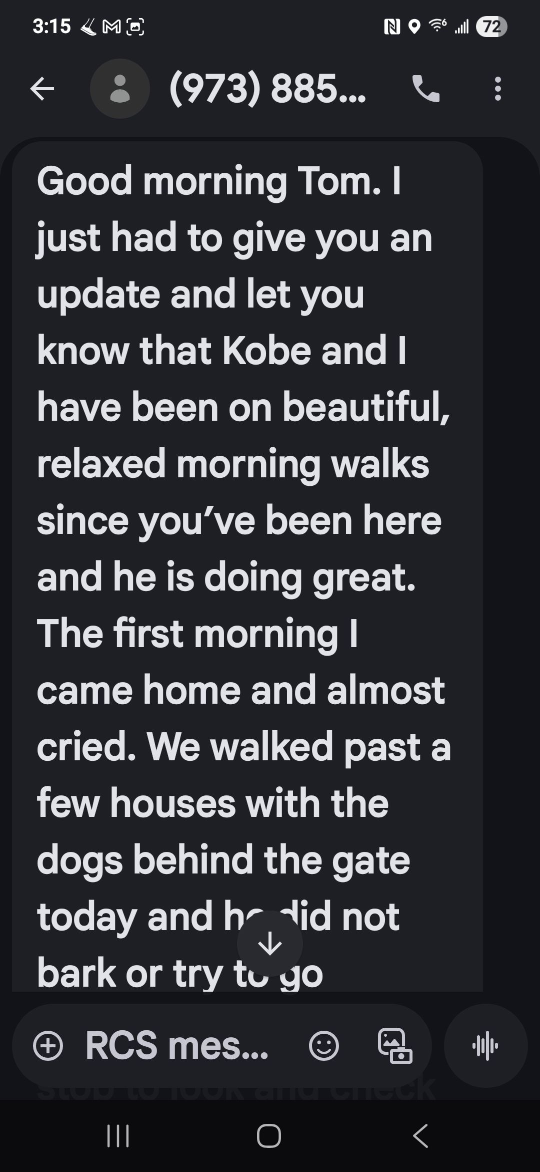 A phone screen showing a dark-mode text message about an update on Kobe and morning dog walking.