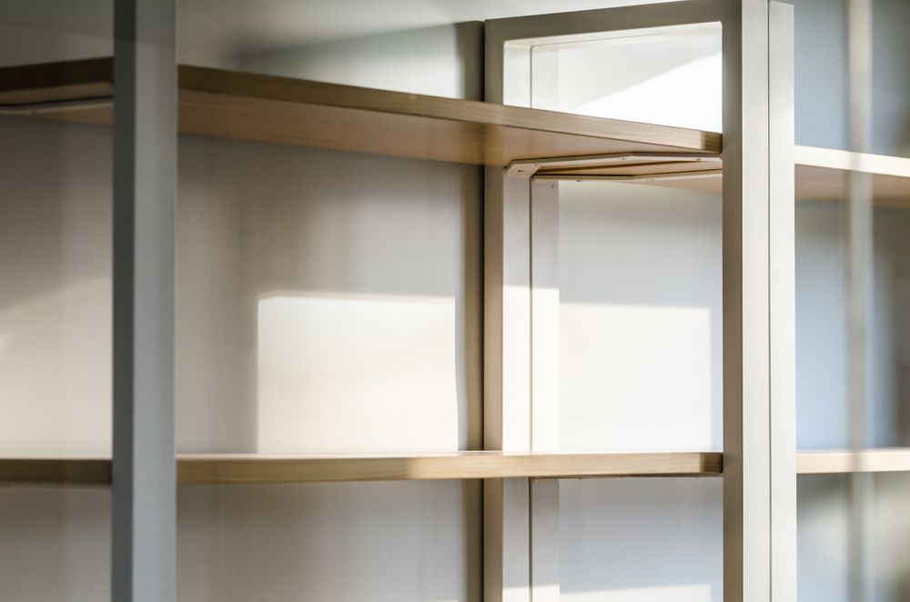 White and Light Wood Built-in Shelving Unit — JWP Painting & Property Services in Ettalong Beach, NSW