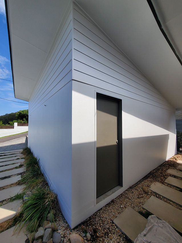 A White House with a Black Door — JWP Painting & Property Services in Umina Beach, NSW