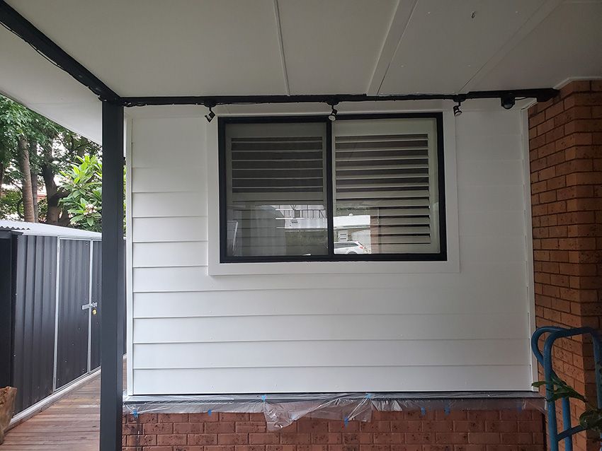 A White House with a Window — JWP Painting & Property Services in Terrigal, NSW