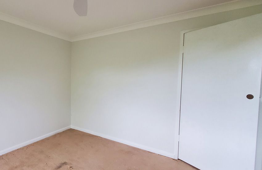 An Empty Room with a Door — JWP Painting & Property Services in Bateau Bay, NSW
