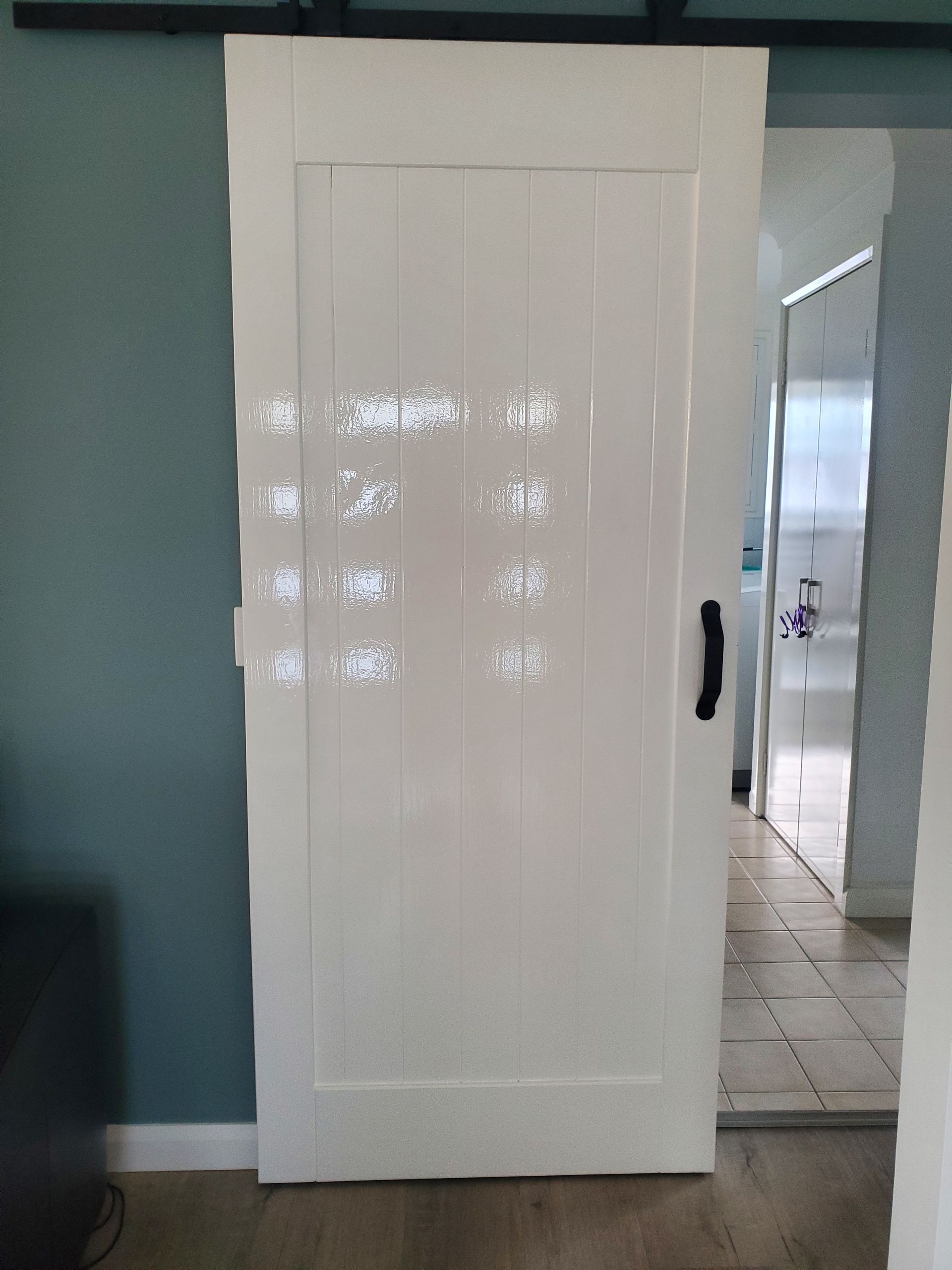 White Sliding Barn Door — JWP Painting & Property Services in Ettalong Beach, NSW