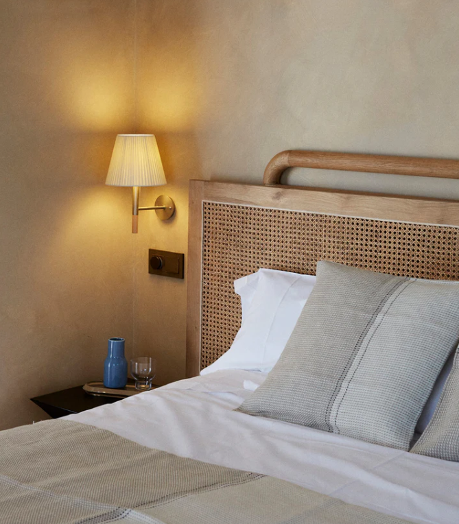 Pendant light hanging above living space for even illumination