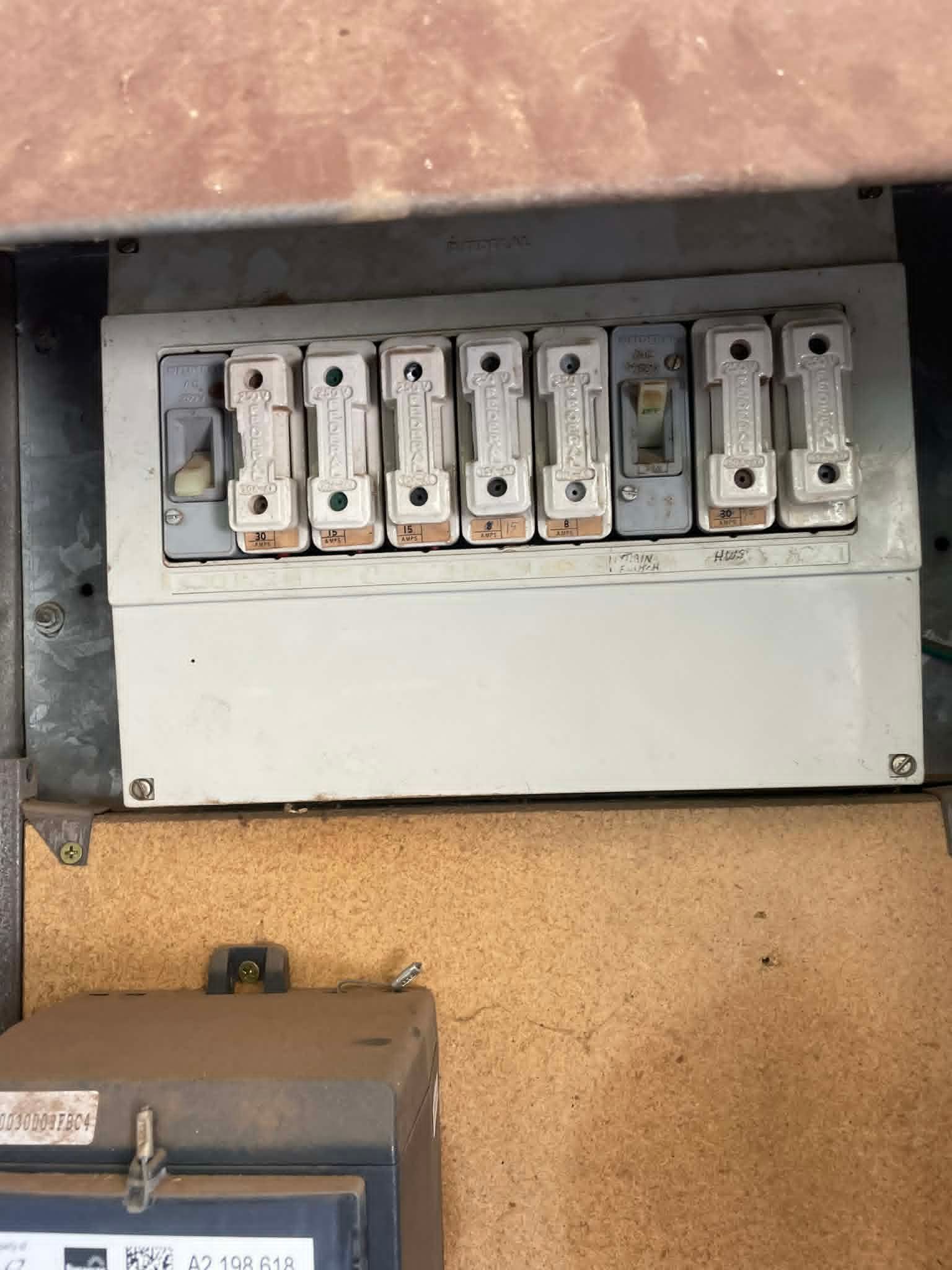 broken switchboard about to be upgraded by Ziesing Electrical